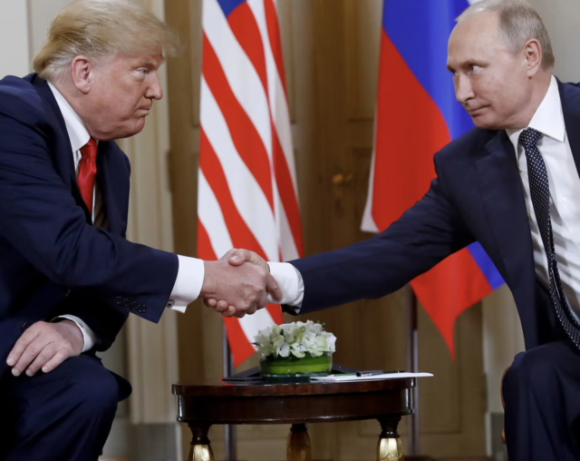 Trump and Putin shake hands